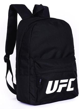 Стильный однотонный черный мужской рюкзак с белой большой надписью на фронтальном...