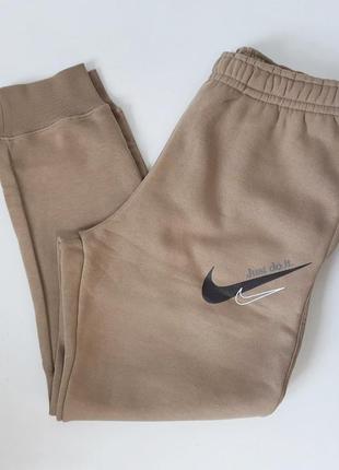 Утеплені штани на флісі nike sportswear m knitted joggers / dr9274-2473 фото