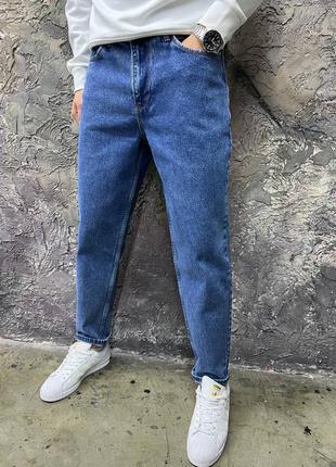 Чоловічі джинси синього кольору1 фото