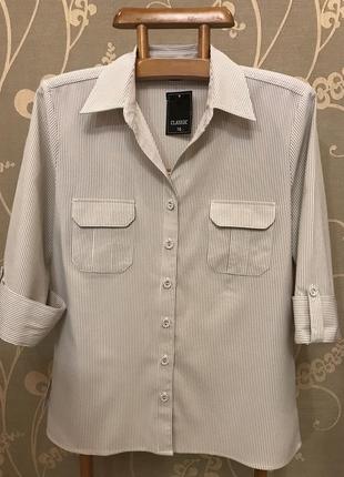 Дуже красива та стильна брендова блузка в смужку.