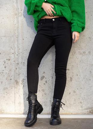 Жіночі чорні утеплені джинси скінні1 фото