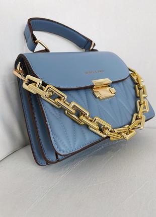 Прекрасная сумка женская сумочка в стиле charles & keith небесно-голубая кожаная7 фото