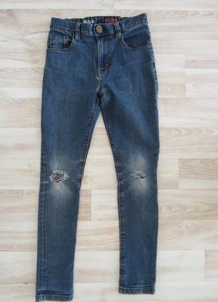 Джинси рванки скінні next