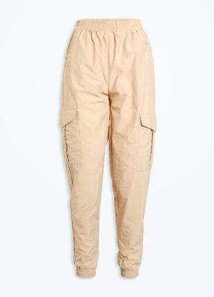 Джогери карго бежеві штани з карманами на резинках