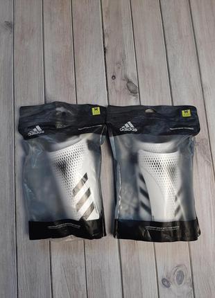 Оригинальные футбольные щитки adidas predator 20 training fs03383 фото