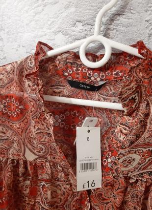 Романтичная блузочка свободного кроя с пышными рукавами и воланами в размере 8.3 фото