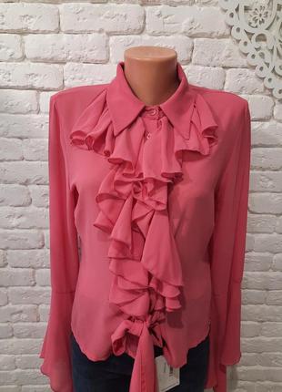 Розовая блуза с рюшами италия