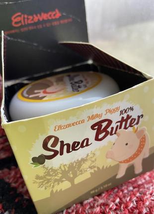 Універсальний крем-бальзам із маслом ши elizavecca face care milky piggy shea butter 100%1 фото