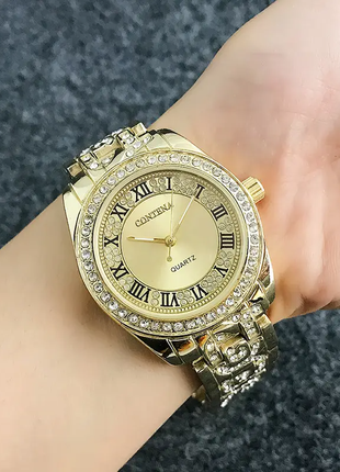 Женские золотистые часы с кристаллами код 6053 фото
