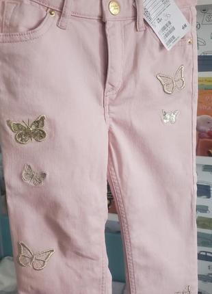 Продам нові фірмові дитячі рожеві джинси для дівчинки h&m 5-6років , зріст 116см гарні метелики святкові2 фото