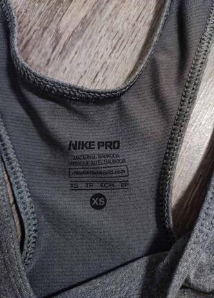 Женская спортивная майка nike pro
made in salvador
оригинал
размер xs9 фото