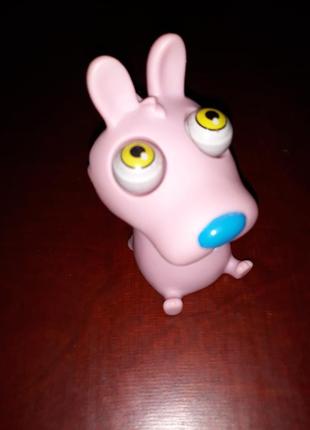 Антистрес собака розовая с глазами резиновый детская игрушка2 фото