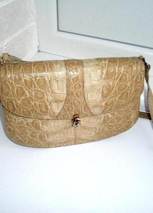 Красивая, винтажная сумка кросс-боди из натуральной кожи.2 фото