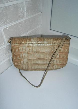 Красивая, винтажная сумка кросс-боди из натуральной кожи.4 фото