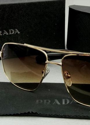 Окуляри унісекс сонцезахисні в золотий металевій оправі