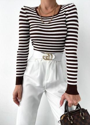 Подовжена смугаста водолазка у рубчик
