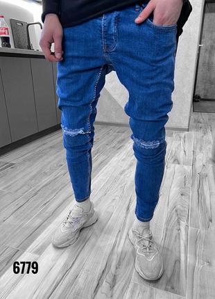 Сині чоловічі базові рвані зауженні джинси