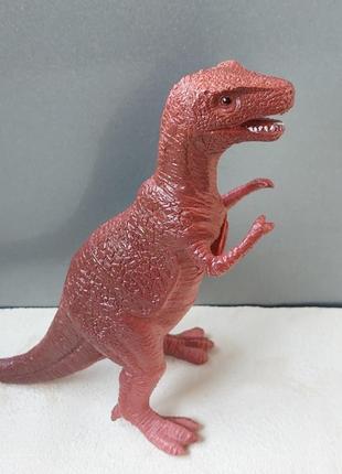 Іграшка динозавр зі звуком2 фото