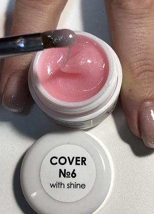 Рожевий гель з дрібними блискітками для укріплення і нарощення нігтів.