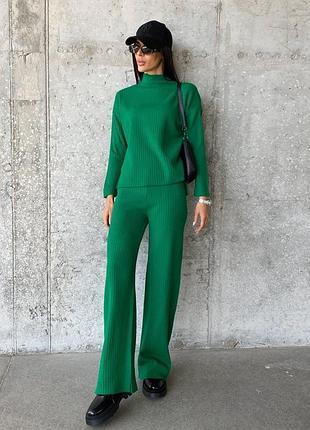 Костюм в рубчик з джемпера та розкльошених брюк