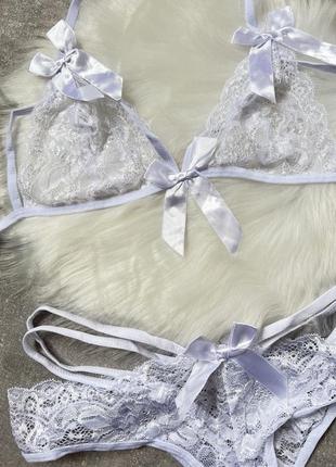 Сексуальное ажурное женское нижнее белье в белом цвете с бантами5 фото