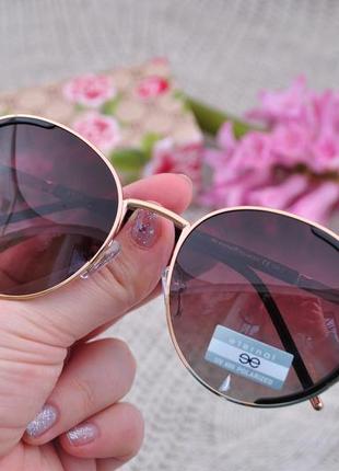Фірмові сонцезахисні круглі окуляри eternal   polarized et33284 фото