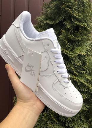 Жіночі кросівки nike air force шкіряні прошиті білі