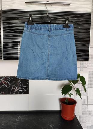 Джинсовая юбка с паэтками переворачиваниями.3 фото