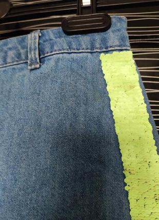 Джинсовая юбка с паэтками переворачиваниями.7 фото