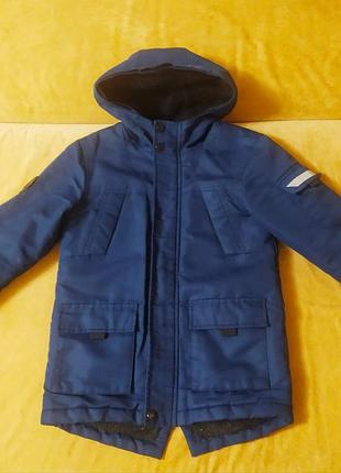 Продам парка 7-8 лет(128-134)