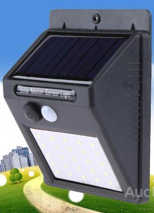 Светодиодный навесной фонарь с датчиком движения 609 + solar 20 диодов9 фото