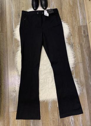 Нові стильні брюки кльош від next