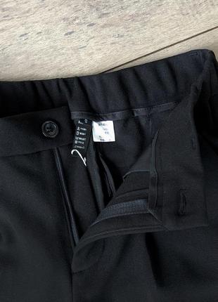 Тёплые плотные брюки в чёрном цвете3 фото