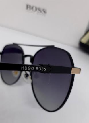 Hugo boss чоловічі сонцезахисні окуляри чорні с золотом градієнт поляризовані9 фото