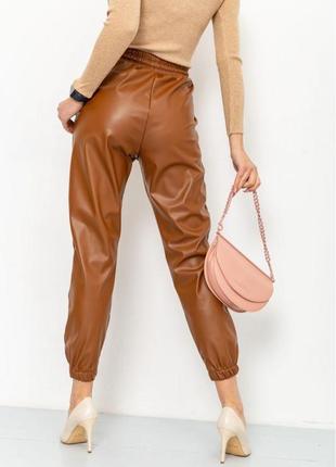 Стильні теплі жіночі брюки джоггери брюки джогери кожані шкіряні жіночі брюки на флісі кожані шкіряні жіночі штани джоггери4 фото