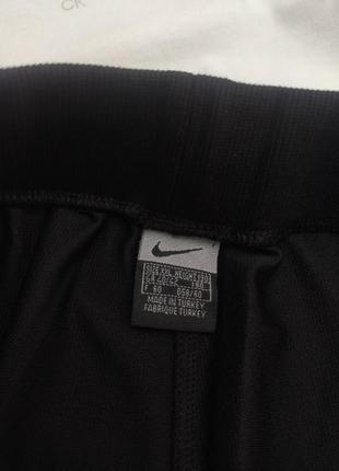 Спортивные штаны от nike р. м - l3 фото