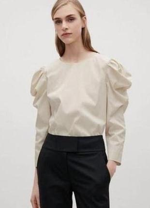 Блуза с воланами свозного кроя1 фото