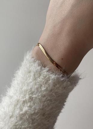Базовый минималистичный плетеный браслет в цвете розовое золото