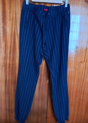 Штани в смужку