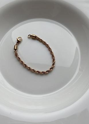 Плетеный браслет в цвете розовое золото2 фото