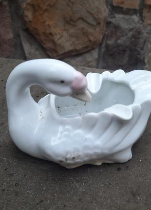 Пеленка лебедь.