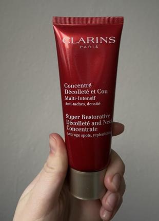 Clarins super restorative decollete and neck concentrate1 фото