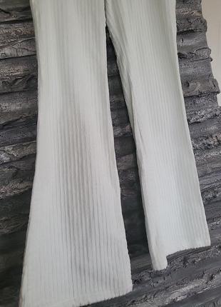 Белые вельветовые  брюки клеша2 фото