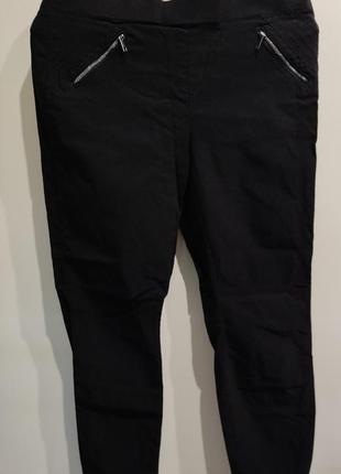 Стрейчевые черные брюки на резинке1 фото