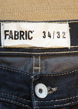 Классные х/б резаные фирменные джинсы цвета  индиго fabric англия 34/323 фото