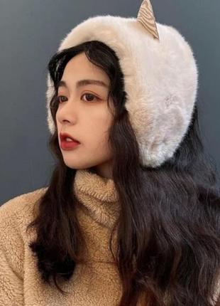 Хутряні пов'язки-навушники з вушками кремовий one size детальніше.