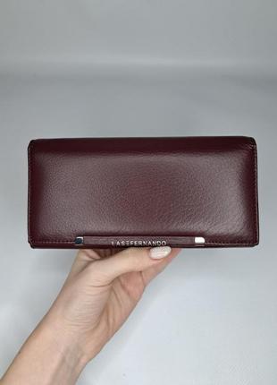 Женский кожаный кошелёк на магните бордовый1 фото