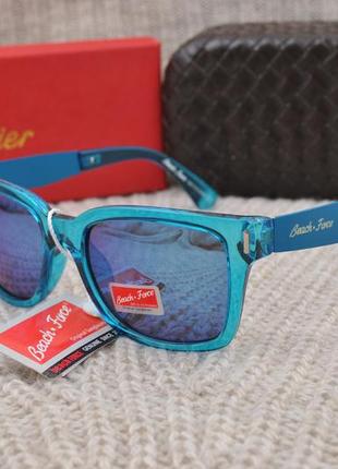 Фирменные солнцезащитные очки в прозрачной оправе  beach force унисекс с зеркальной линзой