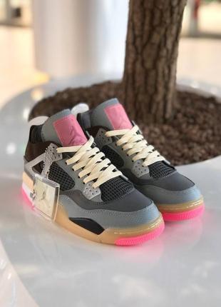 Жіночі кросівки nike air jordan 4 retro grey pink