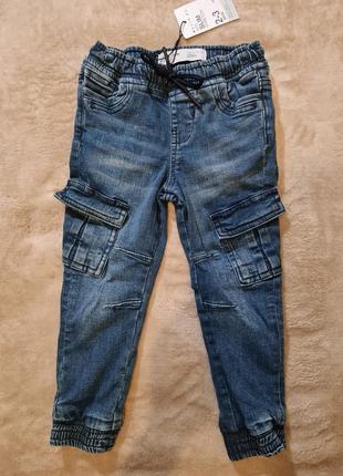Штани джинси на хлопчика 2-3 роки, 98см, нові, стрейчеві, на поясі можна затягнути шнурки.1 фото